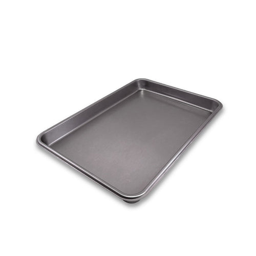 Metal baking tray on a white background