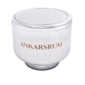 White glass container with 'Ankarsrum' branding on a white background