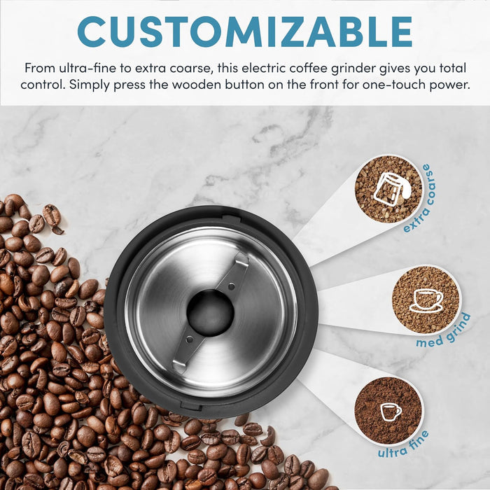 Electric coffee grinder with coffee beans and customization options on a marble background