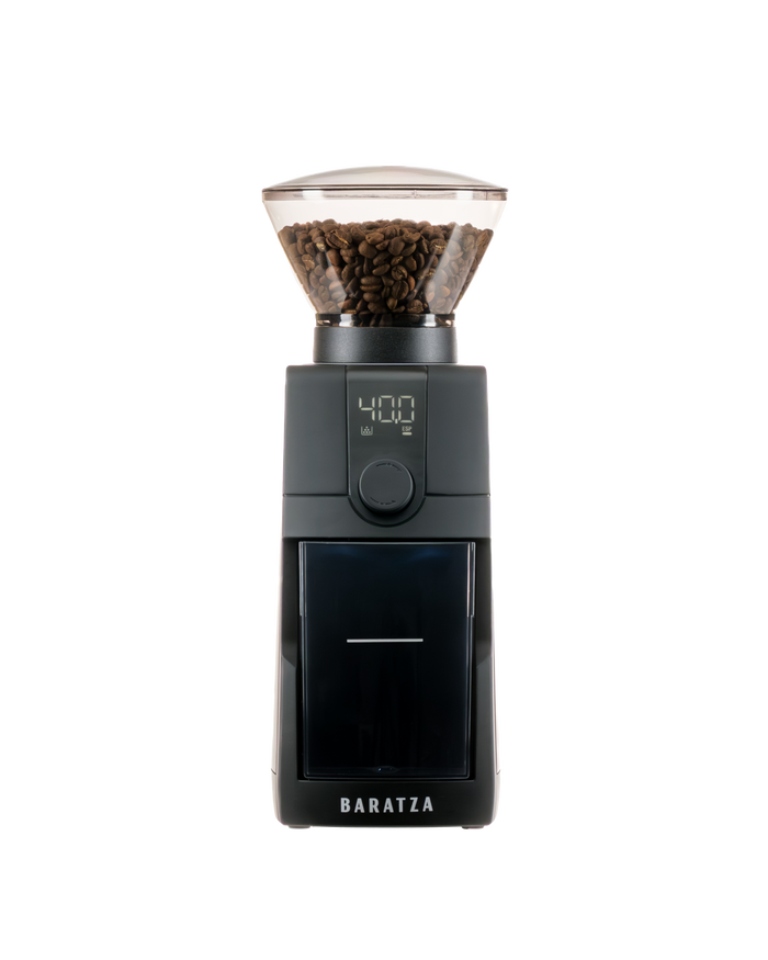 Black coffee grinder with a clear container showing ground coffee on a white background