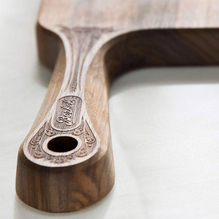 Close up of handle Berkel Cutting Board for Red Line 300 displayed vertically on a white background