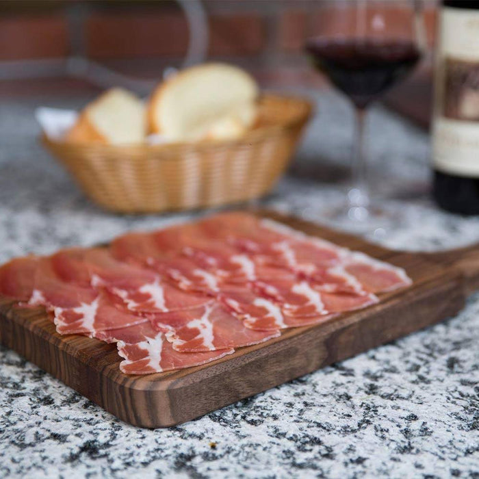Berkel Cutting Board for Red Line 300 with slices of meat on it on a countertop