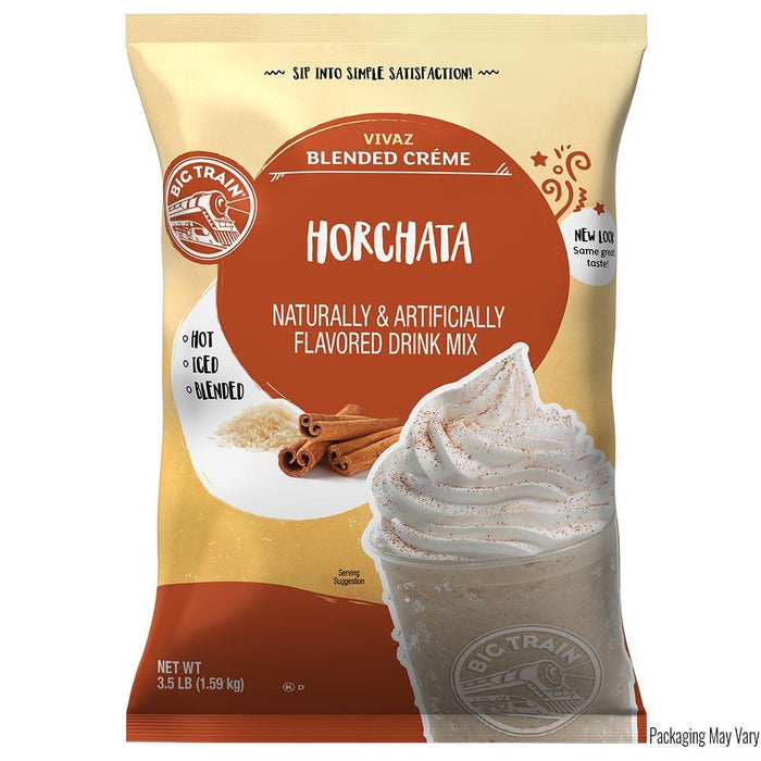 Big Train Vivaz Blended Creme Horchata drink mix package with cinnamon sticks and whipped cream on a white background