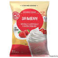 Front view of Big Train Strawberry Blended Creme drink mix package on a white background