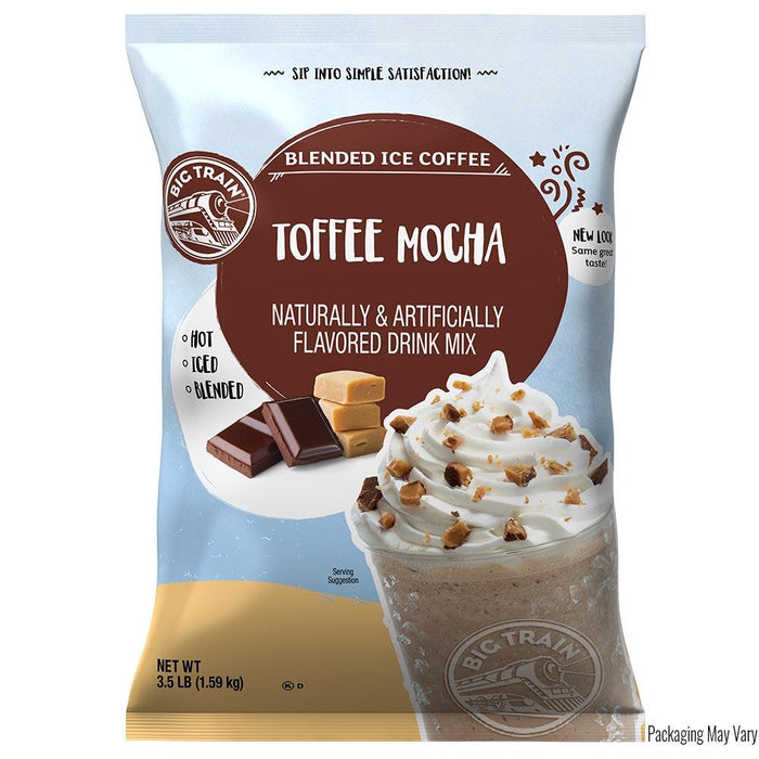 Packaging of Big Train Toffee Mocha blended ice coffee mix with a cup of coffee and toffee bits on a white background.