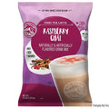 Packaging of Big Train Raspberry Chai Chai Tea Latte drink mix on a white background
