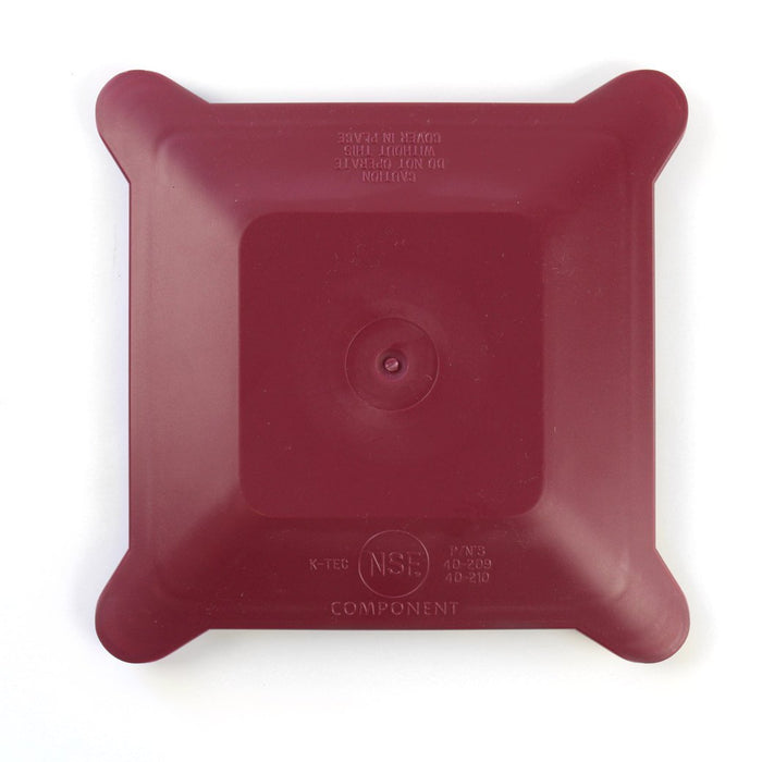 Top view of red Blendtec hard lid for commercial jars displayed on a white background