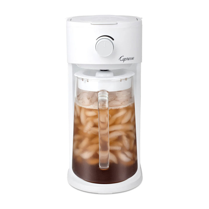 Front view of white Capresso iced tea maker with clear container filled with iced tea displayed on a white background