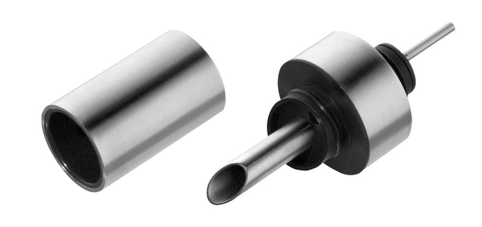 Metallic oil drain plug and cap on a white background