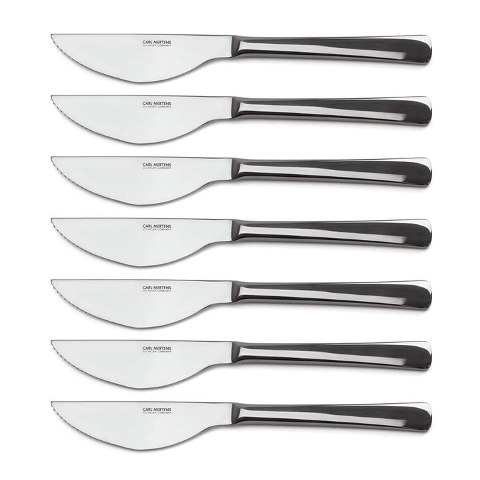 Set of 8 Carl Mertens ultimate dinner knives displayed horizontally on a white background