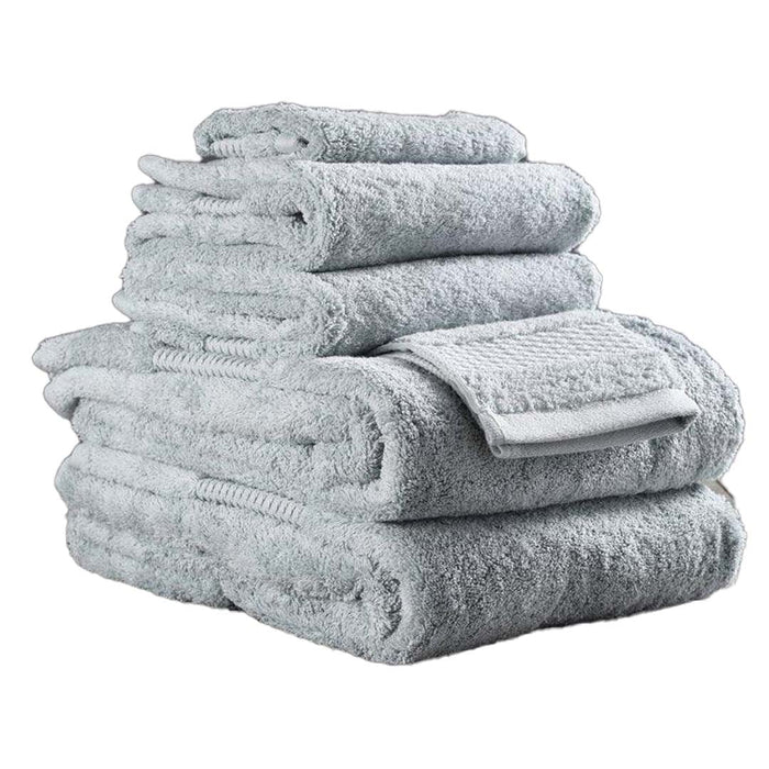 6 piece folded mineral green Delilah Home 100 organic cotton bath towels displayed on a white background
