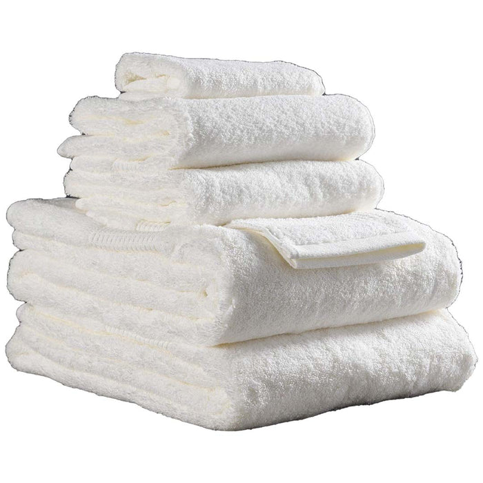 6 piece folded ivory Delilah Home 100 organic cotton bath towels displayed on a white background