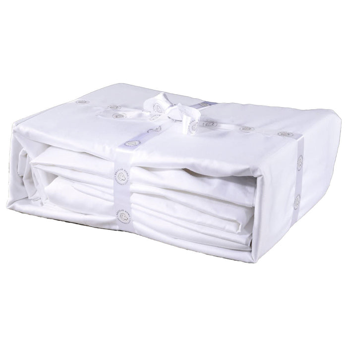 A folded white king Delilah Home 100% Organic Cotton Bed Fitted Sheet set tied with a ribbon, on a white background.
