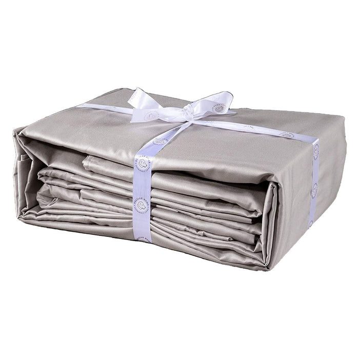A folded slate gray queen Delilah home 100 organic cotton duvet cover tied with a ribbon, on a white background.