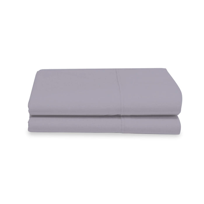 Folded light gray bed sheet on a white background