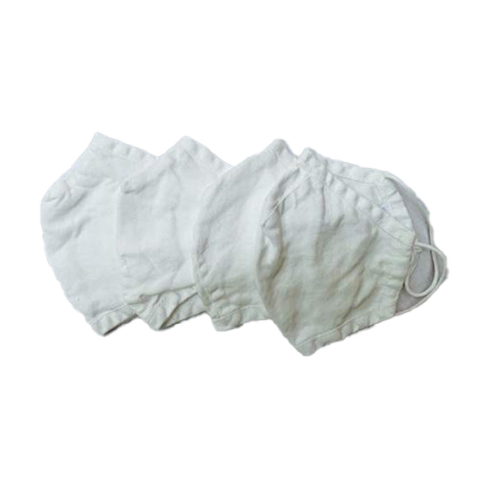 Set of 4 white Delilah home 100 organic hemp essential masks displayed on a white background