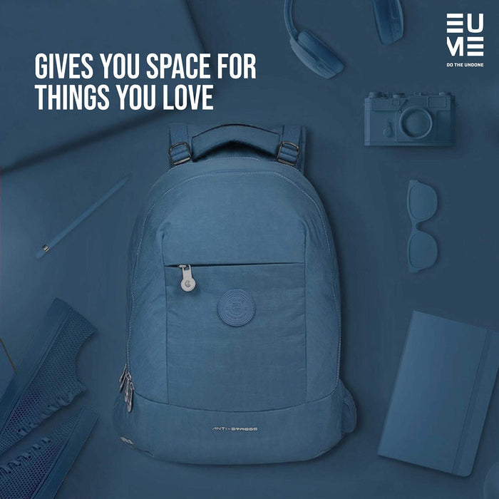Sapphire Eume backpack on a blue background with blue colored items that can fit inside the backpack and text "Gives You Space For Things You Love"