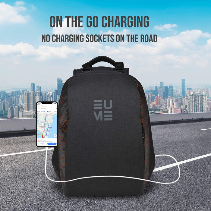 Orange and black Eume backpack with a phone charging using one of the USB ports on a road overlooking a city and text "On The Go Charging No Charging Sockets On The Road"