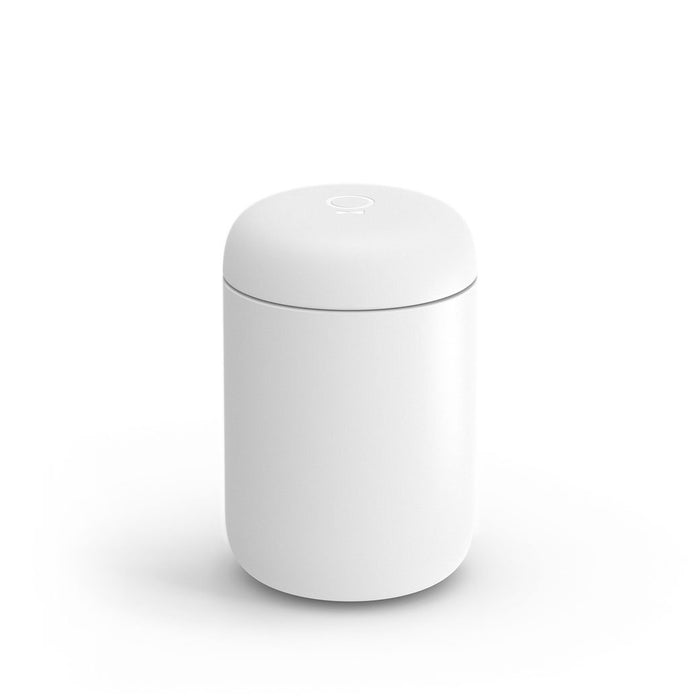 A 12 oz white Fellow Carter Everywhere Mug with a lid displayed on a white background