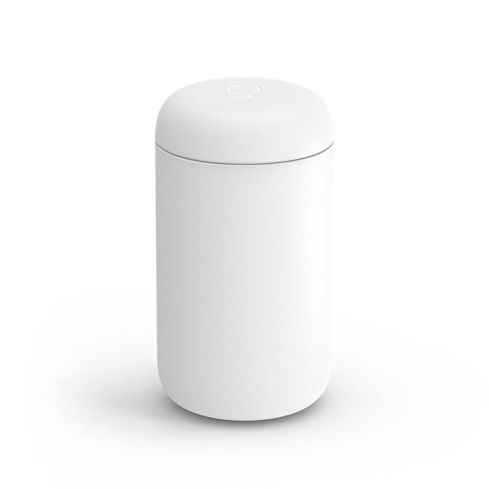 A 16 oz white Fellow Carter Everywhere Mug with a lid displayed on a white background