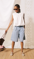 gathered-neck sleeveless blouse