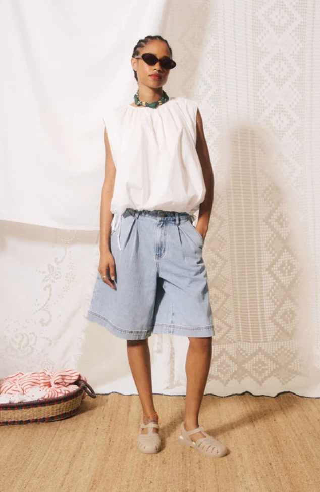 gathered-neck sleeveless blouse