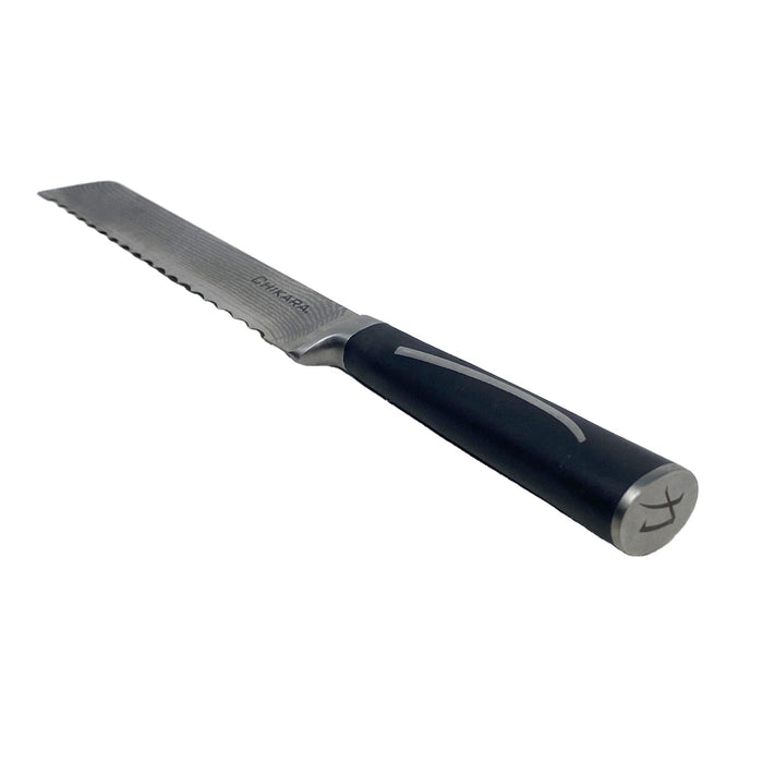 Serrated knife with black handle on a white background