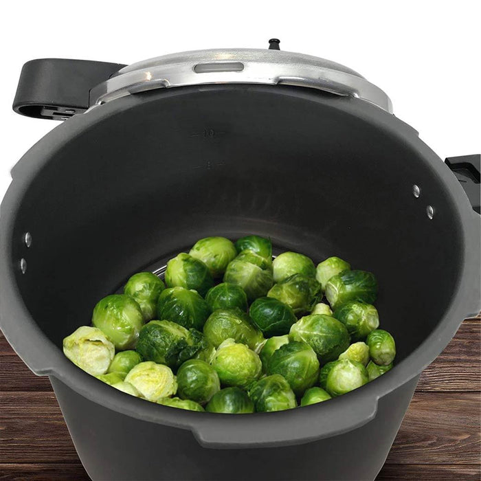Granite Ware Pressure Canner, Cooker, and Steamer with steamed brussel sprouts displayed on a wooden surface