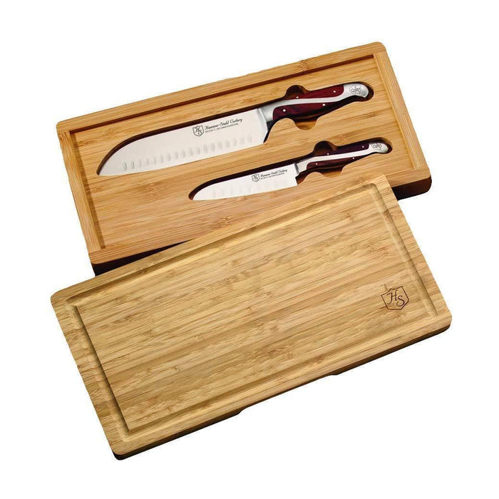 Hammer Stahl 2-Piece Santoku Set with Bamboo Case with knives inserted into bamboo case with lid on the side displayed on a white background