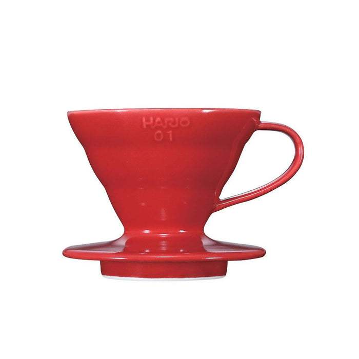 Ceramic red Hario V60 coffee dripper displayed on a white background
