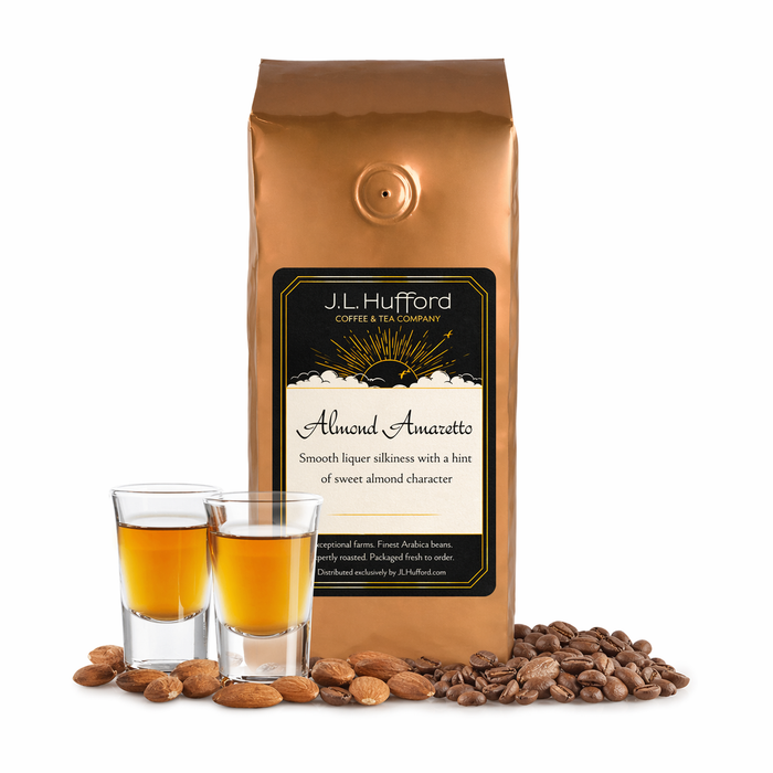 1 lb J.L. Hufford almond amaretto coffee package with two shot glasses, coffee beans, and almonds on a white background