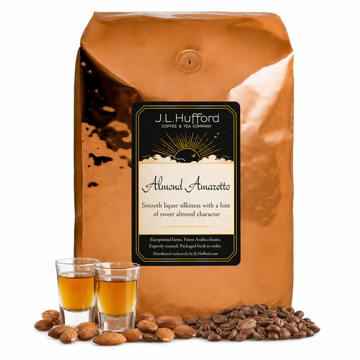 5 lb J.L. Hufford Almond Amaretto coffee bag with 2 shot glasses, almonds, and coffee beans on a white background