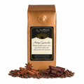 1 lb J.L. Hufford Antigua Guatemalan coffee bag with coffee beans, chocolate shavings and cinnamon sticks in front of the coffee bag