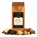 1 lb Brazilian Coffee bag with 'J.L. Hufford' branding and hazelnut, chocolate, vanilla chocolate, and coffee beans on a white background