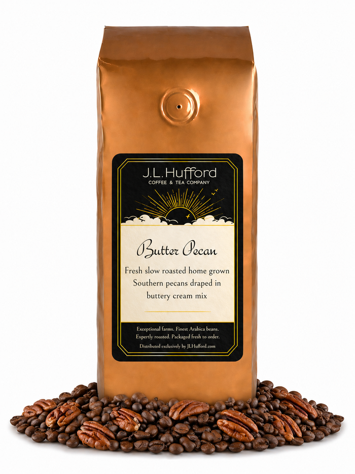 1 lb Coffee bag labeled 'Butter Pecan' by J.L. Hufford with coffee beans and pecans on a white background