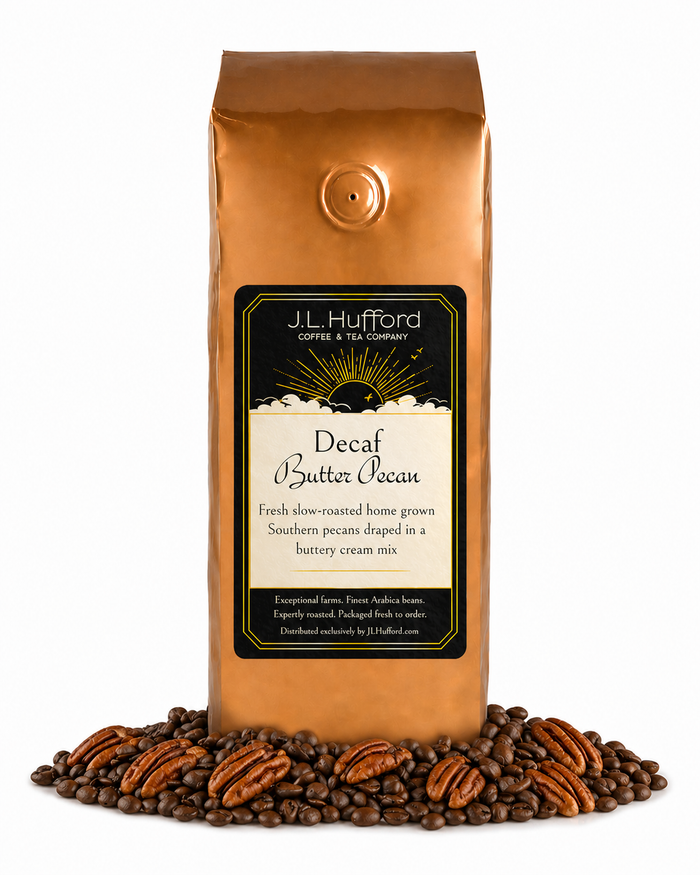1 lb Coffee bag labeled 'Decaf Butter Pecan' by J.L. Hufford with coffee beans and pecans on a white background