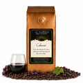 1 lb J.L. Hufford Cabernet coffee bag with coffee beans, red grapes, and a glass of cabernet on a white background