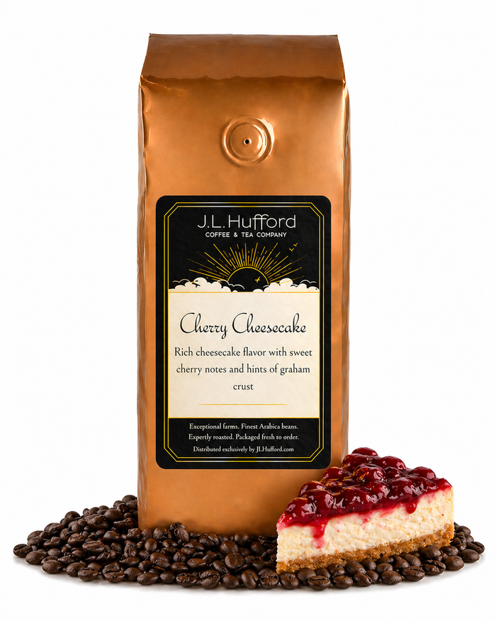 1 lb Cherry Cheesecake coffee beans bag with coffee beans and a slice of cherry cheesecake in front displayed on a white background