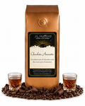 1 lb Coffee bag labeled 'Chocolate Amaretto' by J.L. Hufford with two shot glasses of amaretto, chocolate shavings, and coffee beans.