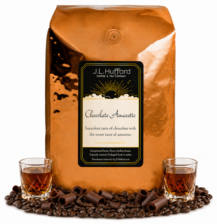 5 lb Coffee bag labeled 'Chocolate Amaretto' by J.L. Hufford with two shot glasses of amaretto, chocolate shavings, and coffee beans.