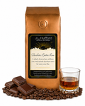 1 lb J.L. Hufford Chocolate Butter Rum coffee bag with coffee beans, milk chocolate bar, and a glass of rum on a white background