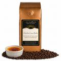 1 lb J.L. Hufford Chocolate Creme Brulee Coffee with coffee beans and creme brulee in front displayed on a white background