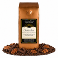 1 lb coffee bag labeled 'Chocolate Pecan' with chocolate pecan flavor, surrounded by coffee beans, chocolate, and pecans on a white background.