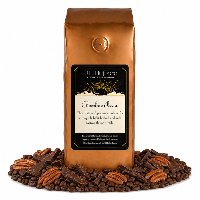 1 lb coffee bag labeled 'Chocolate Pecan' with chocolate pecan flavor, surrounded by coffee beans, chocolate, and pecans on a white background.