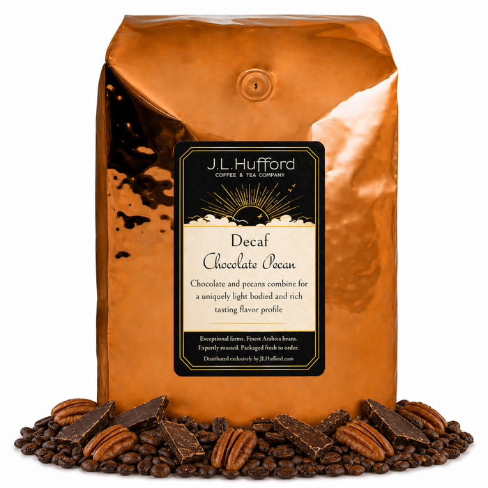 5 lb coffee bag labeled 'Decaf Chocolate Pecan' with chocolate pecan flavor, surrounded by coffee beans, chocolate, and pecans on a white background.