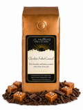 1 lb Chocolate Salted Caramel coffee beans bag with coffee beans, chocolate shavings, and blocks of salted caramel in front displayed on a white background