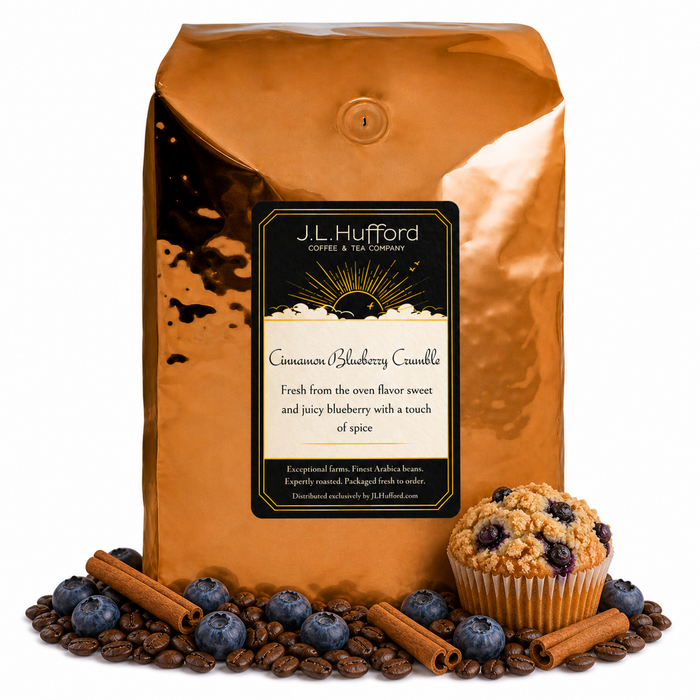 5 lb Cinnamon Blueberry Crumble coffee beans bag with coffee beans, blueberries, cinnamon sticks, and blueberry crumble muffin in front displayed on a white background