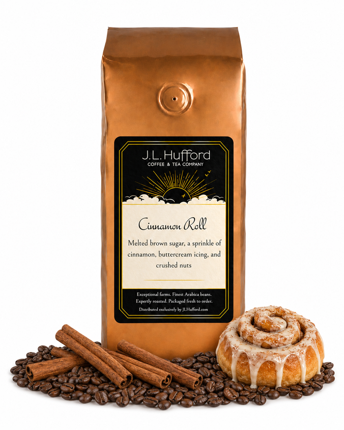 1 lb Cinnamon Roll coffee beans bag with coffee beans, cinnamon sticks, and cinnamon roll in front displayed on a white background