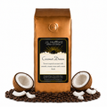 1 lb Coconut Dream coffee beans bag with coffee beans and split coconut in front displayed on a white background