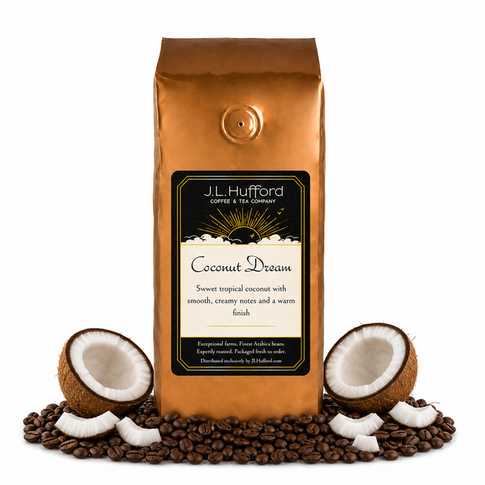 1 lb Coconut Dream coffee beans bag with coffee beans and split coconut in front displayed on a white background